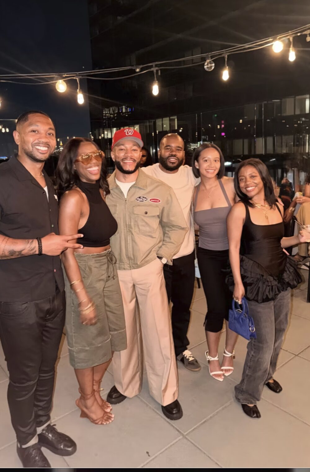 SpelHouse Class of 2016 alumni together at a rooftop reunion event